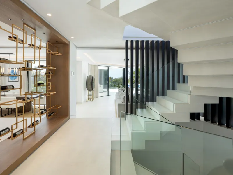 This is a contemporary 5-bedroom luxury villa for sale in the prestigious La Quinta Golf Resort, Benahavís, offering panoramic views and exceptional modern living in one of the Costa del Sol's most desirable gated communities.