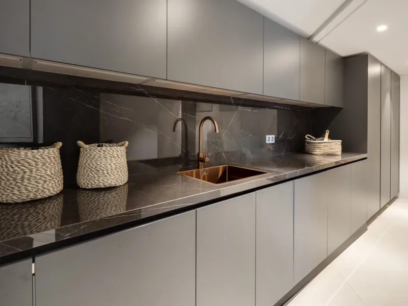 This is a contemporary 5-bedroom luxury villa for sale in the prestigious La Quinta Golf Resort, Benahavís, offering panoramic views and exceptional modern living in one of the Costa del Sol's most desirable gated communities.