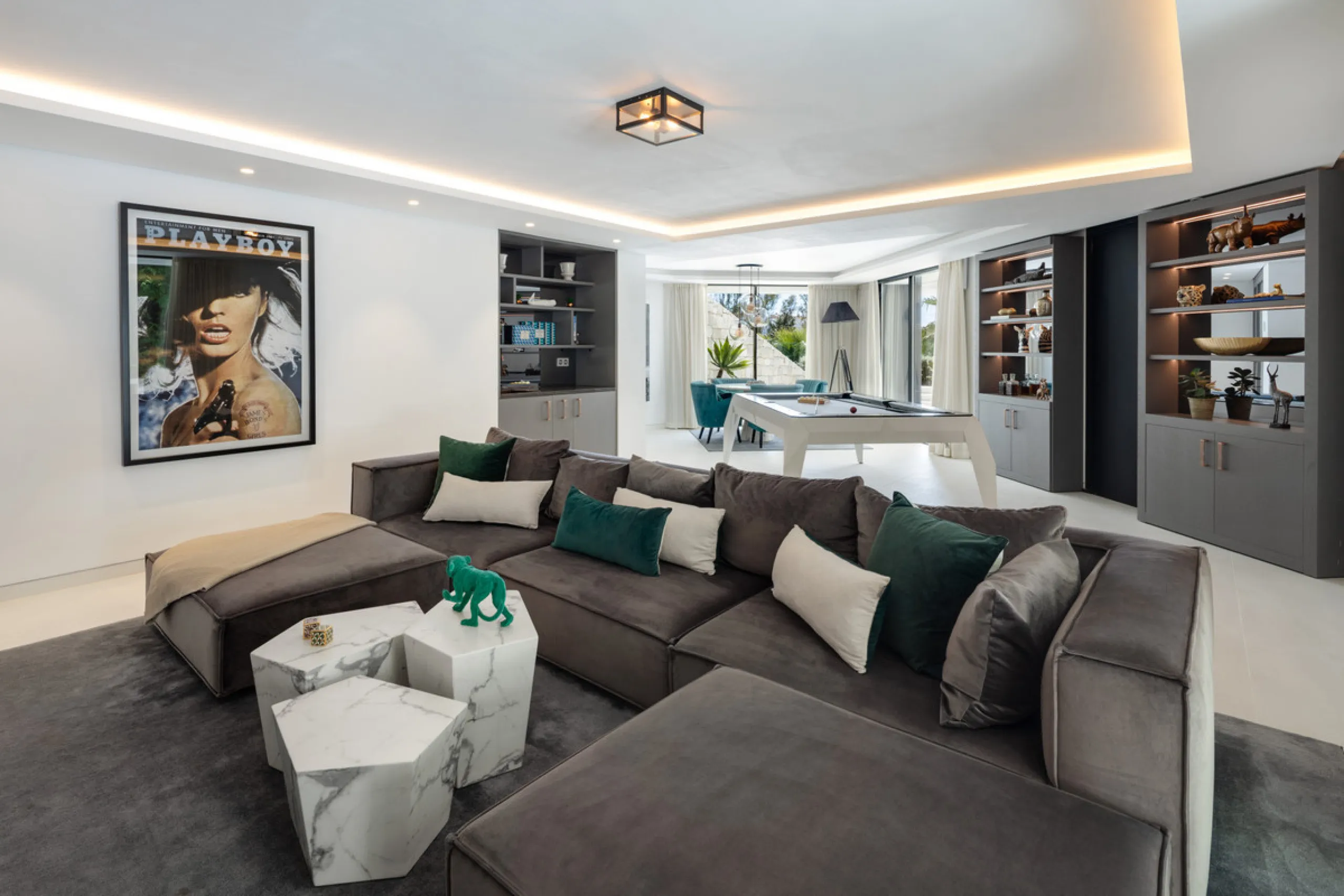 This is a contemporary 5-bedroom luxury villa for sale in the prestigious La Quinta Golf Resort, Benahavís, offering panoramic views and exceptional modern living in one of the Costa del Sol's most desirable gated communities.