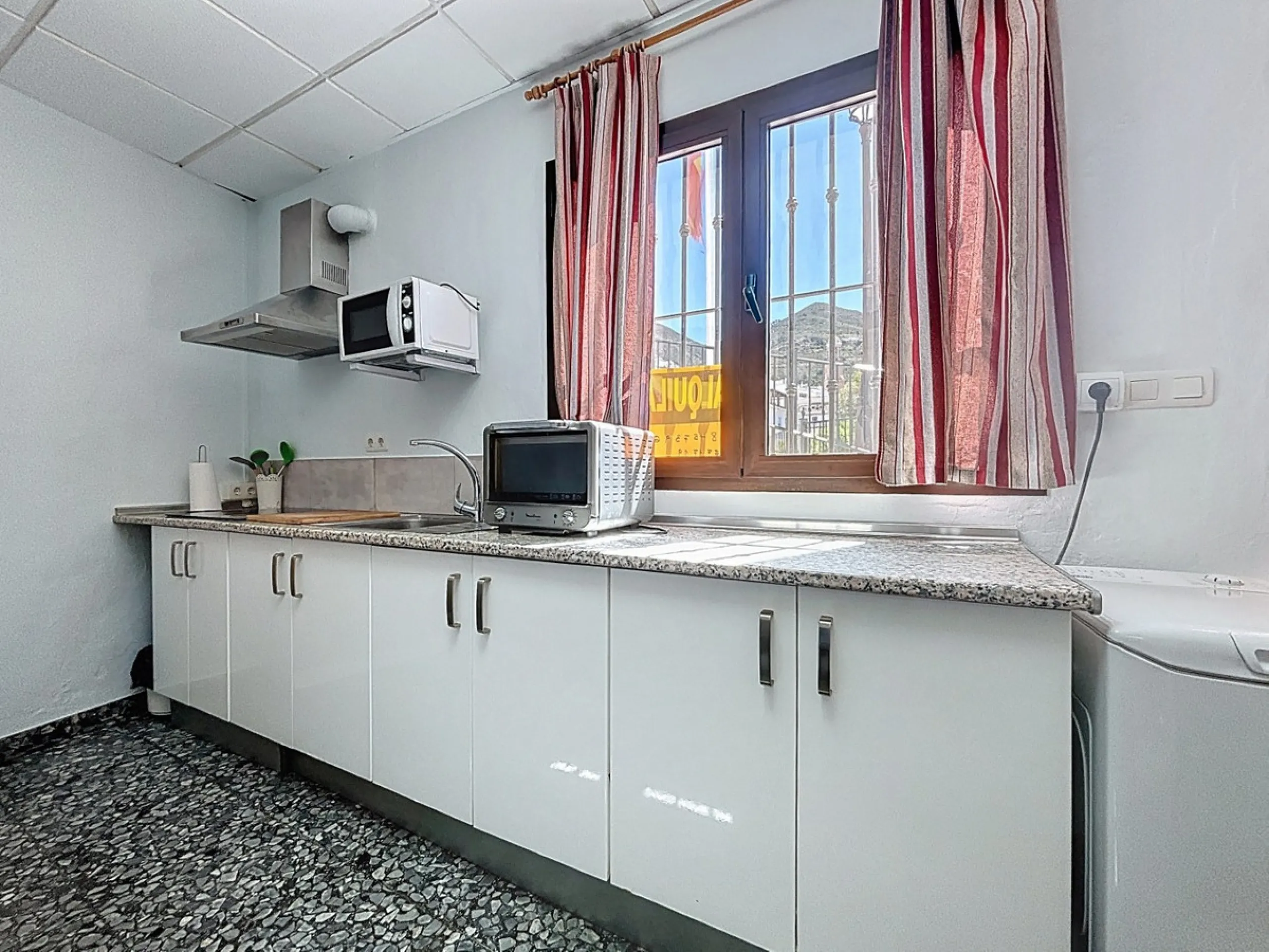 Situated in the charming, whitewashed village of Cómpeta, this versatile house offers an ideal setup for private use, rental investment, or multi-generational living. Divided into three independent apartments, it provides great flexibility whether youre l
