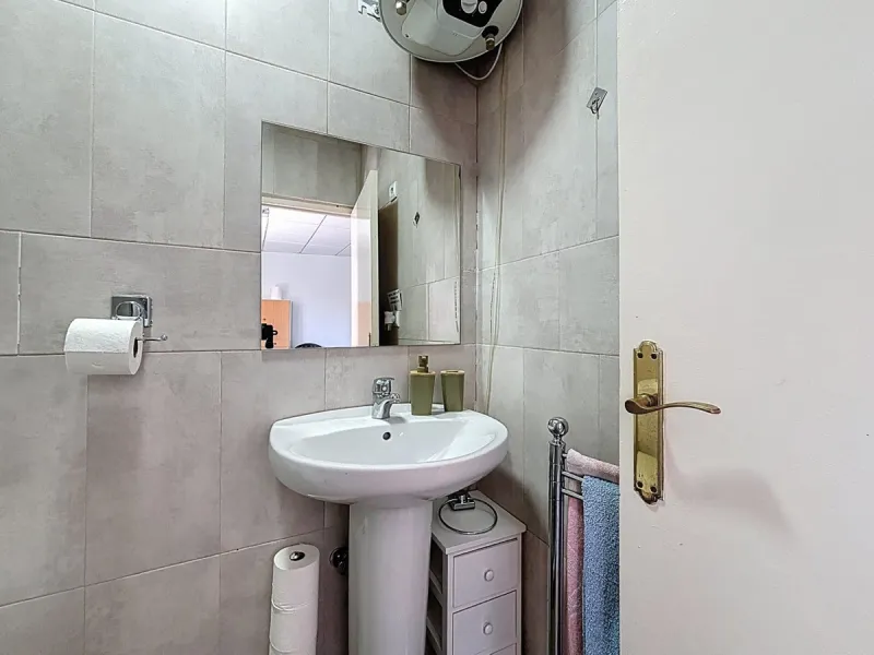 Situated in the charming, whitewashed village of Cómpeta, this versatile house offers an ideal setup for private use, rental investment, or multi-generational living. Divided into three independent apartments, it provides great flexibility whether youre l