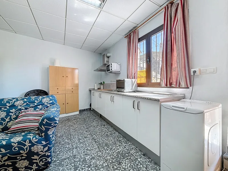 Situated in the charming, whitewashed village of Cómpeta, this versatile house offers an ideal setup for private use, rental investment, or multi-generational living. Divided into three independent apartments, it provides great flexibility whether youre l