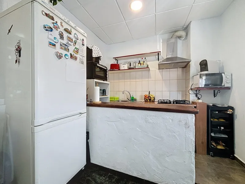 Situated in the charming, whitewashed village of Cómpeta, this versatile house offers an ideal setup for private use, rental investment, or multi-generational living. Divided into three independent apartments, it provides great flexibility whether youre l