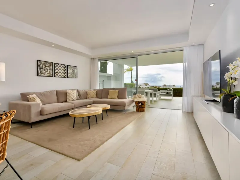 We are pleased to present this bright; modern  and stunning elevated ground floor apartment in the heart of  Casares; Alcazaba lagoon.  The open-concept living area seamlessly connects to a modern dining space, creating a comfortable environment filled wi
