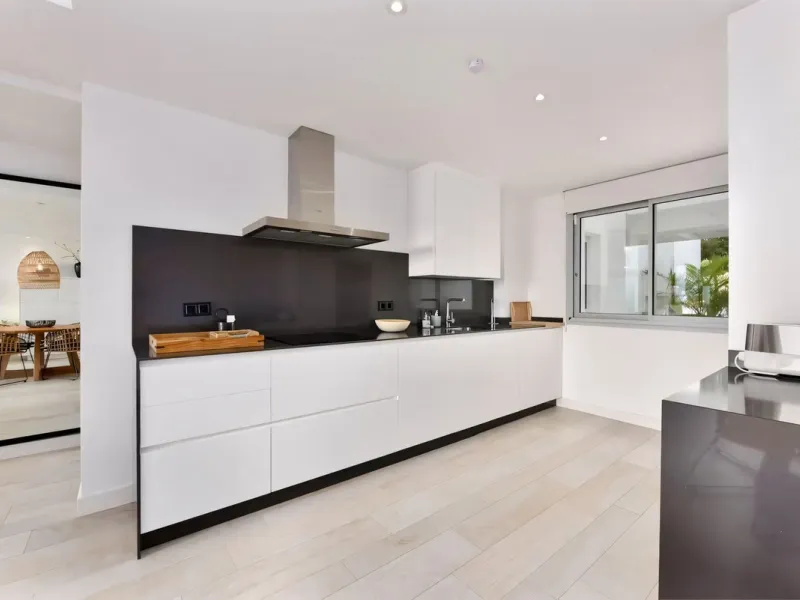 We are pleased to present this bright; modern  and stunning elevated ground floor apartment in the heart of  Casares; Alcazaba lagoon.  The open-concept living area seamlessly connects to a modern dining space, creating a comfortable environment filled wi