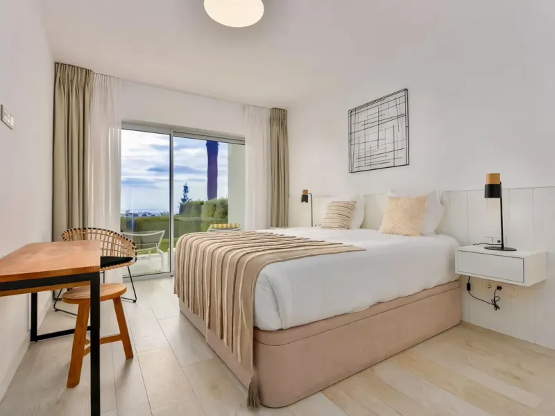 We are pleased to present this bright; modern  and stunning elevated ground floor apartment in the heart of  Casares; Alcazaba lagoon.  The open-concept living area seamlessly connects to a modern dining space, creating a comfortable environment filled wi