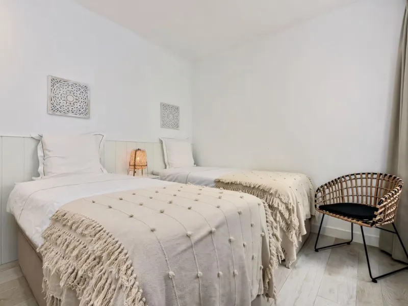 We are pleased to present this bright; modern  and stunning elevated ground floor apartment in the heart of  Casares; Alcazaba lagoon.  The open-concept living area seamlessly connects to a modern dining space, creating a comfortable environment filled wi