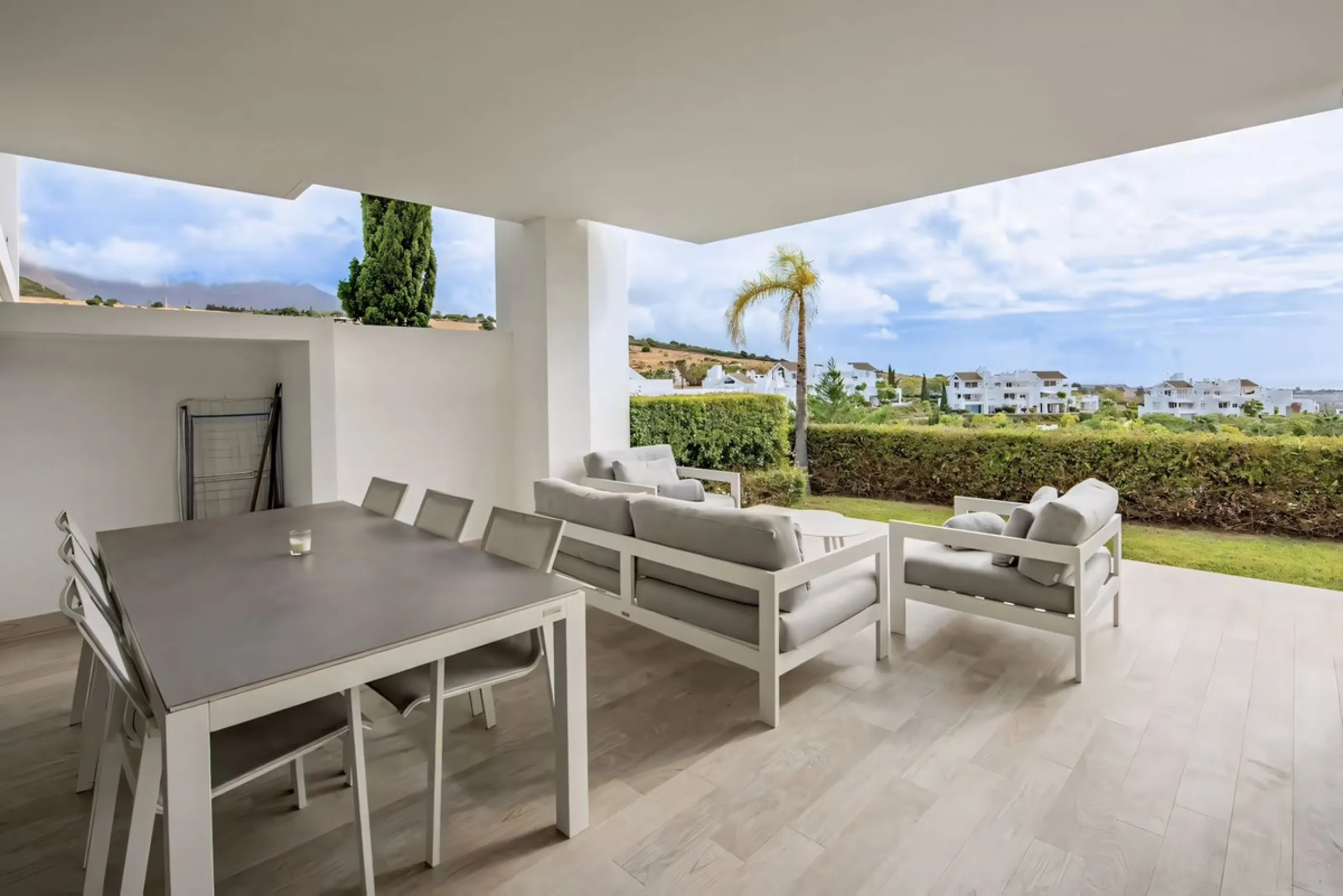 We are pleased to present this bright; modern  and stunning elevated ground floor apartment in the heart of  Casares; Alcazaba lagoon.  The open-concept living area seamlessly connects to a modern dining space, creating a comfortable environment filled wi