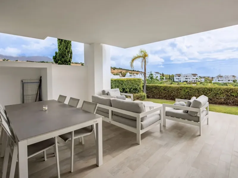 We are pleased to present this bright; modern  and stunning elevated ground floor apartment in the heart of  Casares; Alcazaba lagoon.  The open-concept living area seamlessly connects to a modern dining space, creating a comfortable environment filled wi