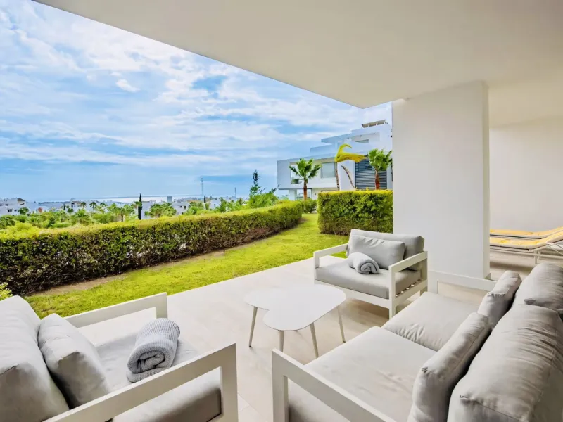 We are pleased to present this bright; modern  and stunning elevated ground floor apartment in the heart of  Casares; Alcazaba lagoon.  The open-concept living area seamlessly connects to a modern dining space, creating a comfortable environment filled wi