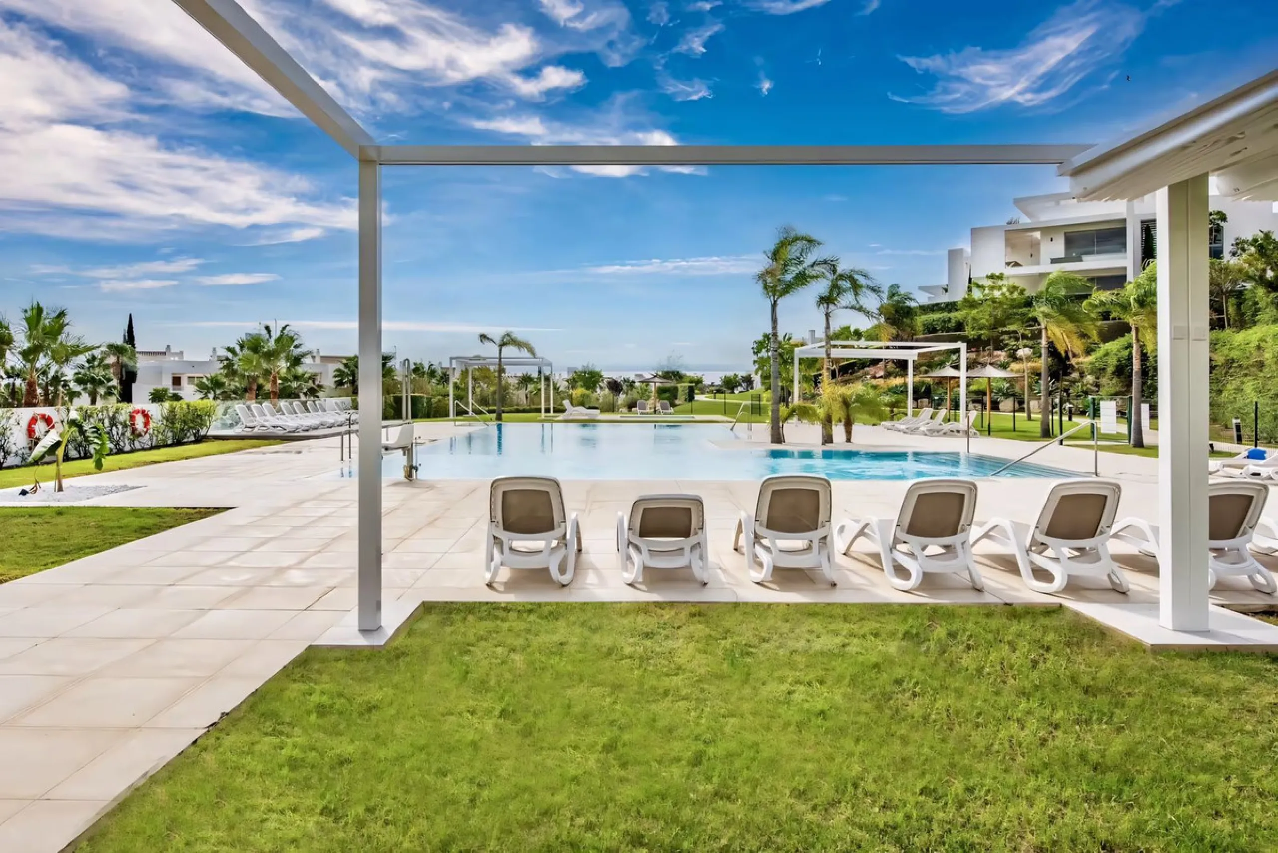 We are pleased to present this bright; modern  and stunning elevated ground floor apartment in the heart of  Casares; Alcazaba lagoon.  The open-concept living area seamlessly connects to a modern dining space, creating a comfortable environment filled wi