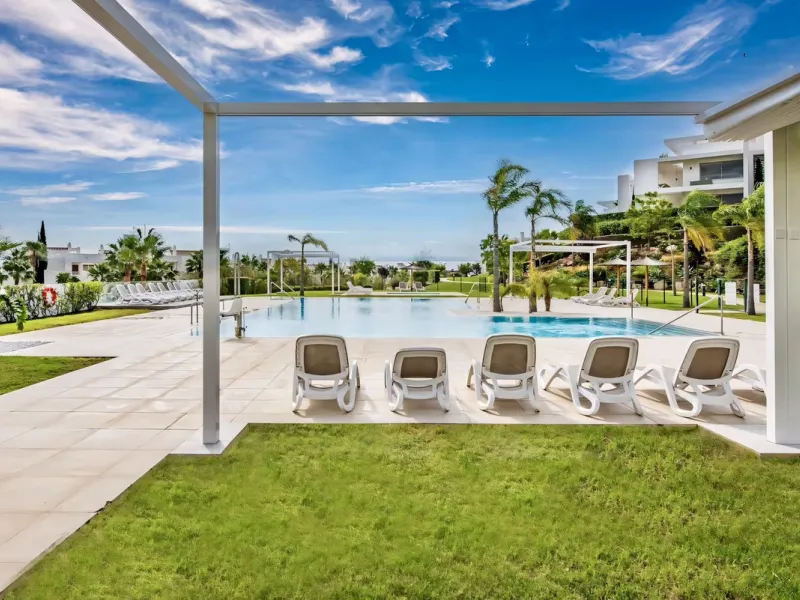 We are pleased to present this bright; modern  and stunning elevated ground floor apartment in the heart of  Casares; Alcazaba lagoon.  The open-concept living area seamlessly connects to a modern dining space, creating a comfortable environment filled wi