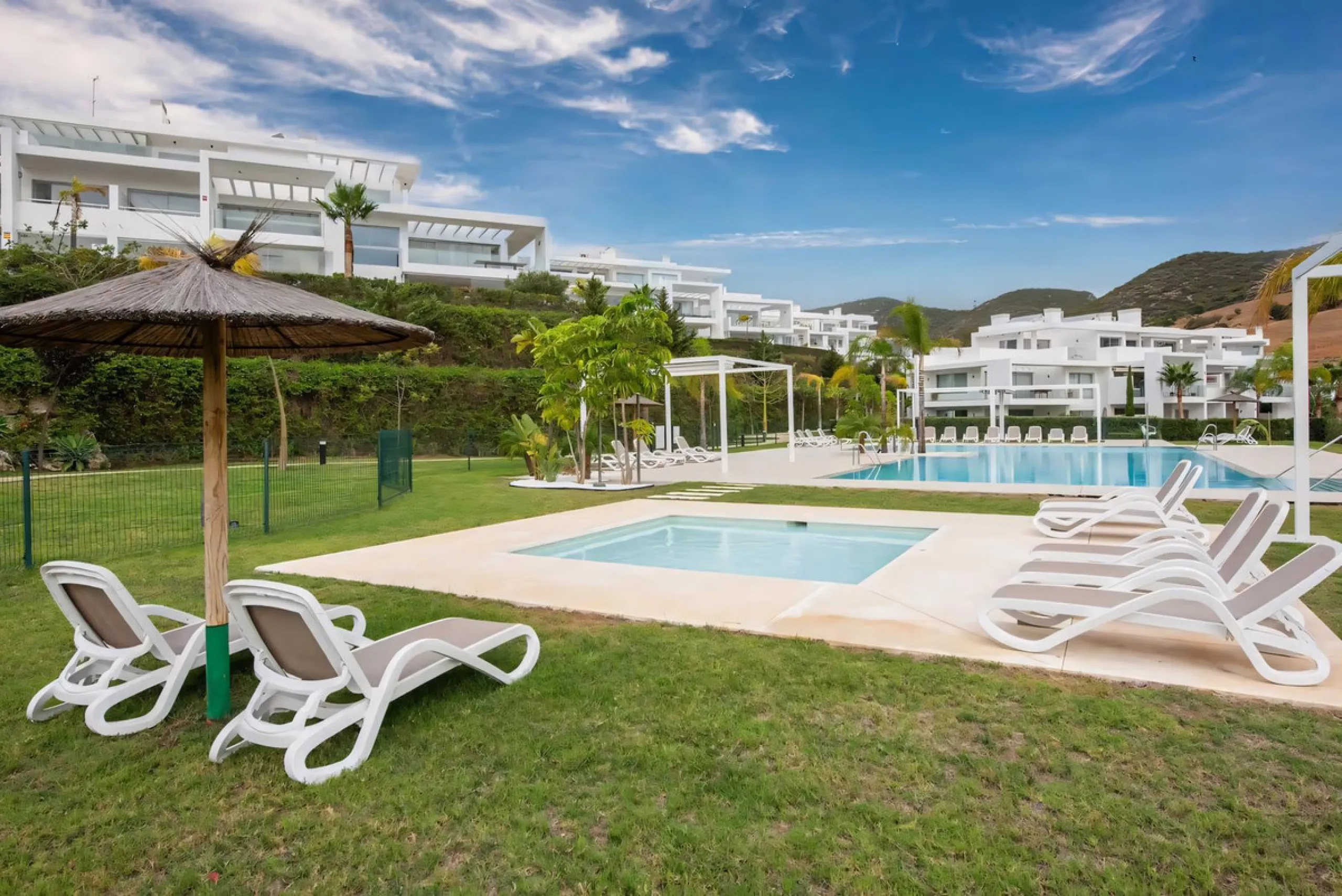 We are pleased to present this bright; modern  and stunning elevated ground floor apartment in the heart of  Casares; Alcazaba lagoon.  The open-concept living area seamlessly connects to a modern dining space, creating a comfortable environment filled wi