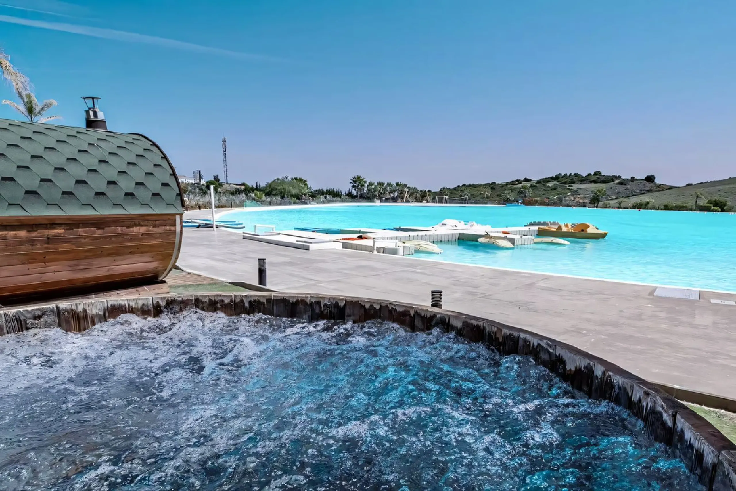 We are pleased to present this bright; modern  and stunning elevated ground floor apartment in the heart of  Casares; Alcazaba lagoon.  The open-concept living area seamlessly connects to a modern dining space, creating a comfortable environment filled wi