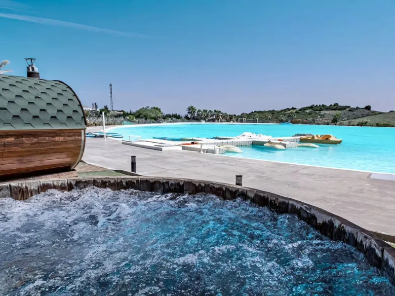 We are pleased to present this bright; modern  and stunning elevated ground floor apartment in the heart of  Casares; Alcazaba lagoon.  The open-concept living area seamlessly connects to a modern dining space, creating a comfortable environment filled wi
