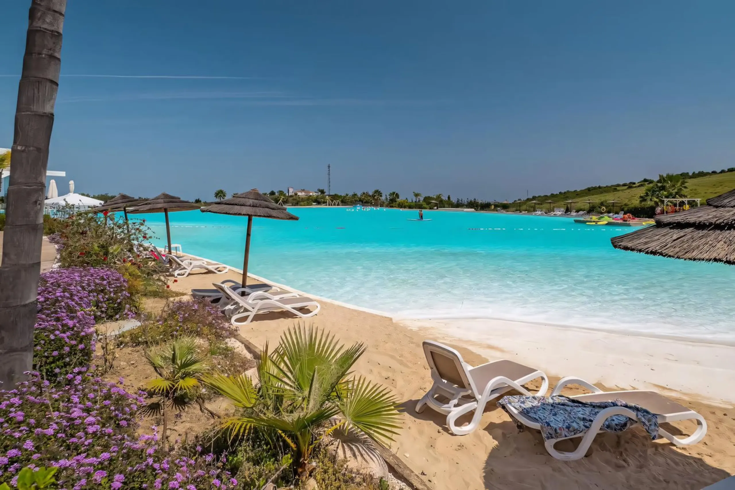 We are pleased to present this bright; modern  and stunning elevated ground floor apartment in the heart of  Casares; Alcazaba lagoon.  The open-concept living area seamlessly connects to a modern dining space, creating a comfortable environment filled wi