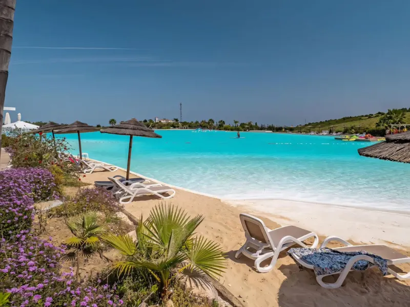 We are pleased to present this bright; modern  and stunning elevated ground floor apartment in the heart of  Casares; Alcazaba lagoon.  The open-concept living area seamlessly connects to a modern dining space, creating a comfortable environment filled wi