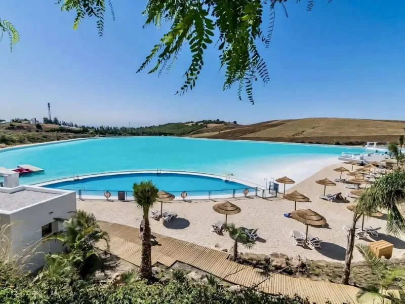 We are pleased to present this bright; modern  and stunning elevated ground floor apartment in the heart of  Casares; Alcazaba lagoon.  The open-concept living area seamlessly connects to a modern dining space, creating a comfortable environment filled wi
