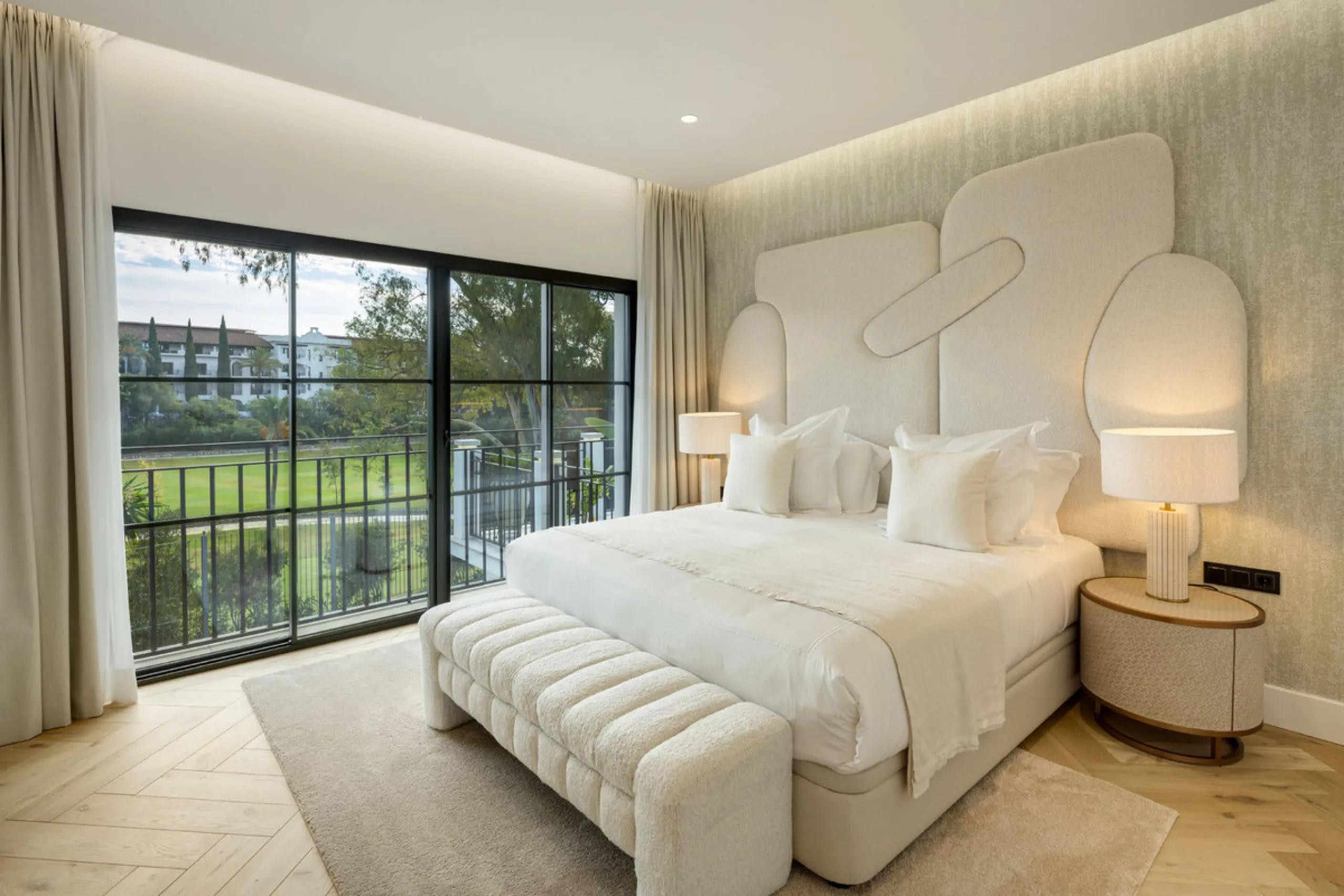 Exceptional villa for sale in the prestigious gated community of El Herrojo Alto, one of La Quinta's most sought-after residential areas. Positioned on an elevated frontline golf plot, this landmark property harmoniously blends timeless Andalusian archite