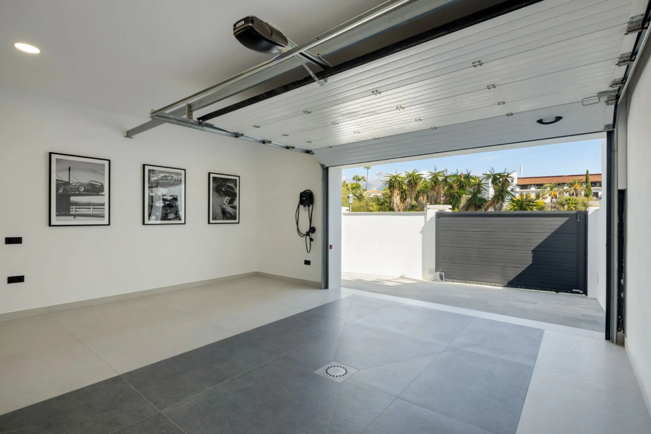 Exceptional villa for sale in the prestigious gated community of El Herrojo Alto, one of La Quinta's most sought-after residential areas. Positioned on an elevated frontline golf plot, this landmark property harmoniously blends timeless Andalusian archite
