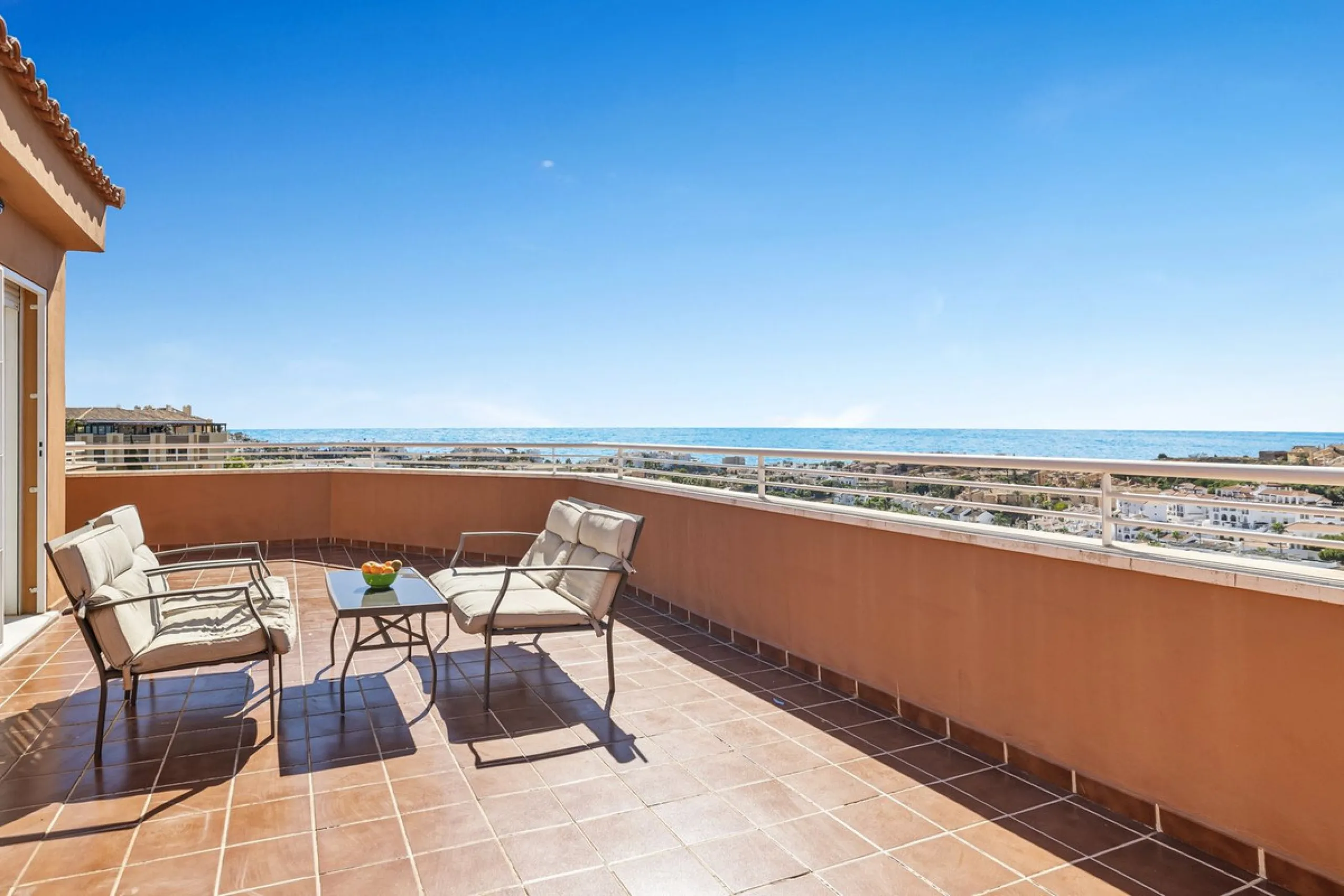 BEST BUY ALERT (Massively Reduced) - 2 bed, 2 bath penthouse in Mijas Costa with enormous 150m2 wrap around terrace / solarium, all with beautiful panoramic sea views.