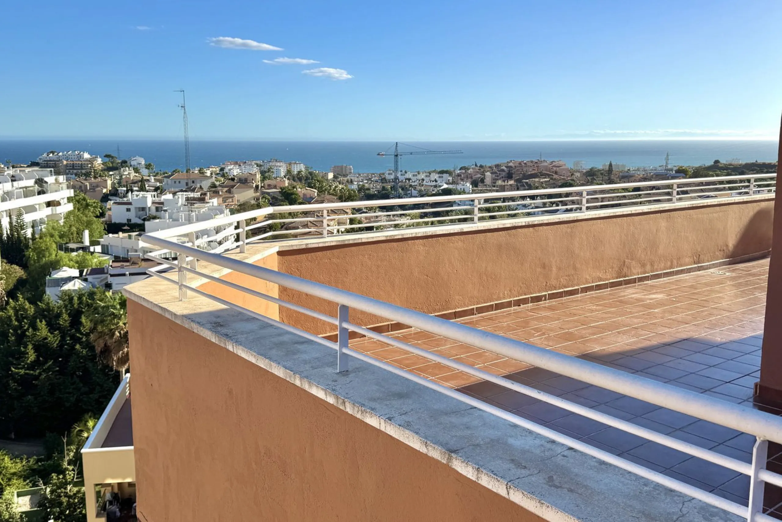 BEST BUY ALERT (Massively Reduced) - 2 bed, 2 bath penthouse in Mijas Costa with enormous 150m2 wrap around terrace / solarium, all with beautiful panoramic sea views.