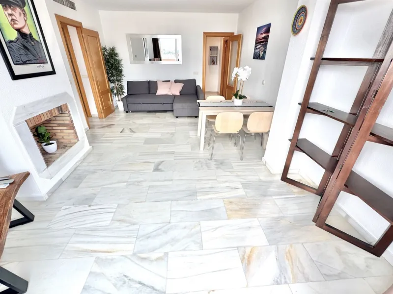 BEST BUY ALERT (Massively Reduced) - 2 bed, 2 bath penthouse in Mijas Costa with enormous 150m2 wrap around terrace / solarium, all with beautiful panoramic sea views.