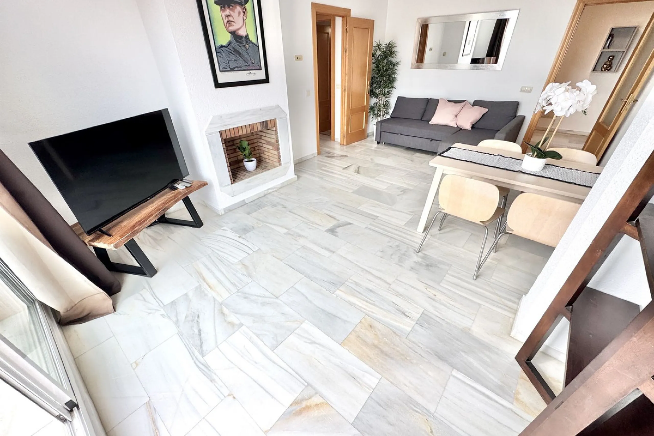 BEST BUY ALERT (Massively Reduced) - 2 bed, 2 bath penthouse in Mijas Costa with enormous 150m2 wrap around terrace / solarium, all with beautiful panoramic sea views.