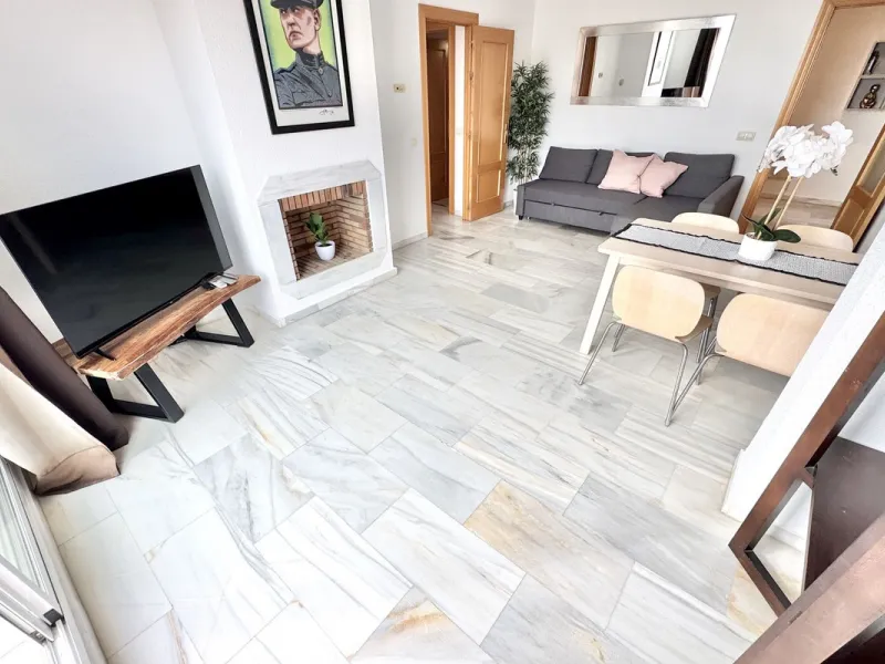 BEST BUY ALERT (Massively Reduced) - 2 bed, 2 bath penthouse in Mijas Costa with enormous 150m2 wrap around terrace / solarium, all with beautiful panoramic sea views.
