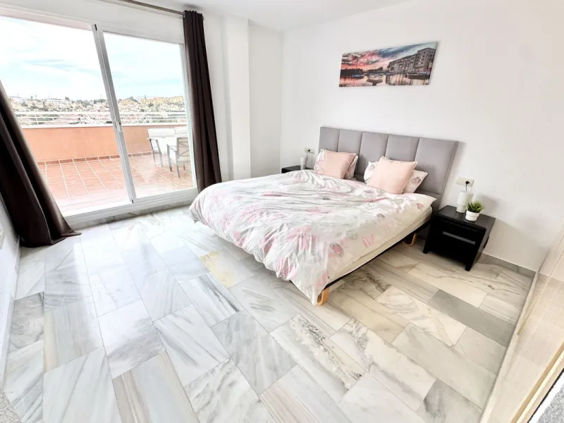 BEST BUY ALERT (Massively Reduced) - 2 bed, 2 bath penthouse in Mijas Costa with enormous 150m2 wrap around terrace / solarium, all with beautiful panoramic sea views.