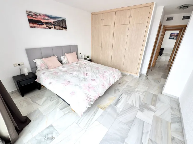 BEST BUY ALERT (Massively Reduced) - 2 bed, 2 bath penthouse in Mijas Costa with enormous 150m2 wrap around terrace / solarium, all with beautiful panoramic sea views.
