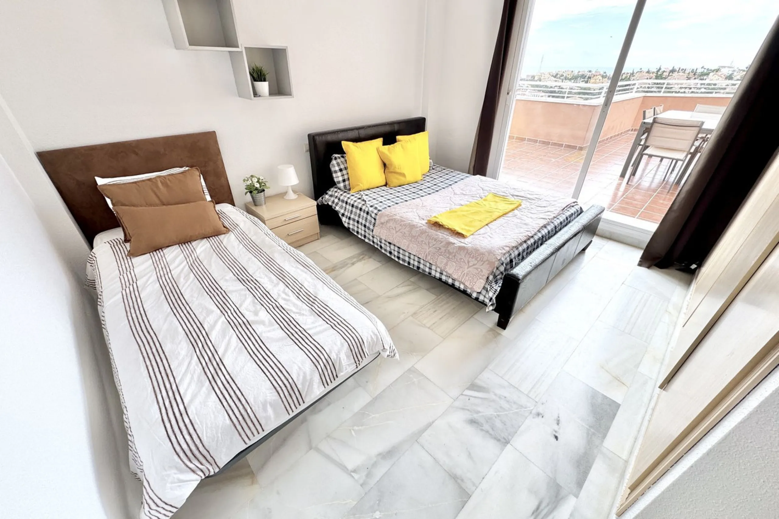 BEST BUY ALERT (Massively Reduced) - 2 bed, 2 bath penthouse in Mijas Costa with enormous 150m2 wrap around terrace / solarium, all with beautiful panoramic sea views.