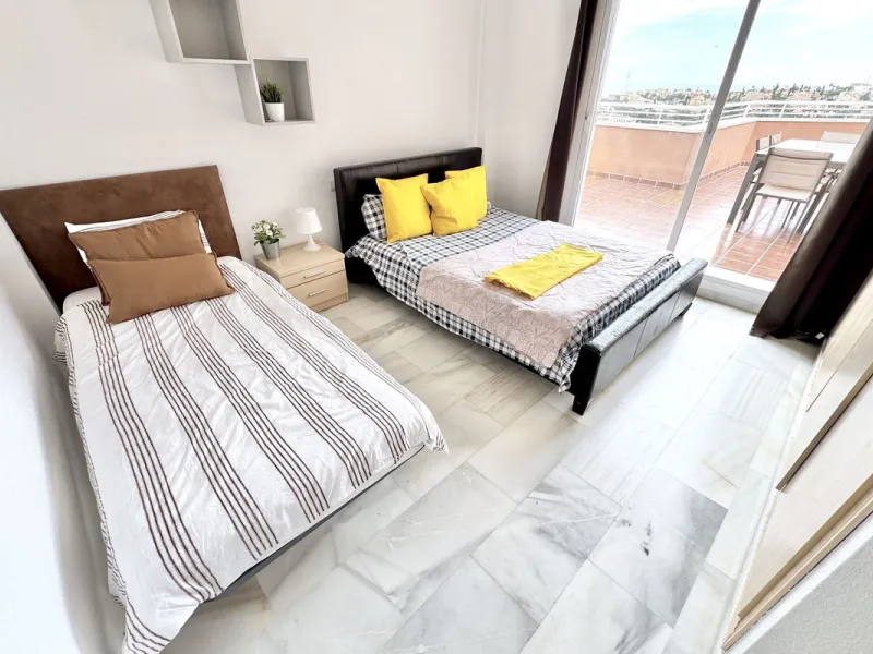 BEST BUY ALERT (Massively Reduced) - 2 bed, 2 bath penthouse in Mijas Costa with enormous 150m2 wrap around terrace / solarium, all with beautiful panoramic sea views.