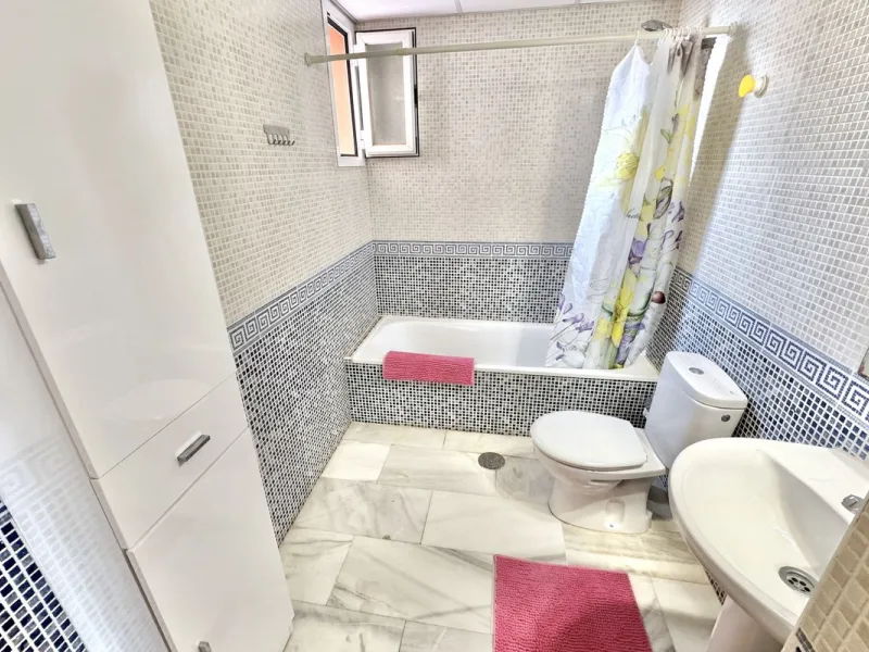 BEST BUY ALERT (Massively Reduced) - 2 bed, 2 bath penthouse in Mijas Costa with enormous 150m2 wrap around terrace / solarium, all with beautiful panoramic sea views.