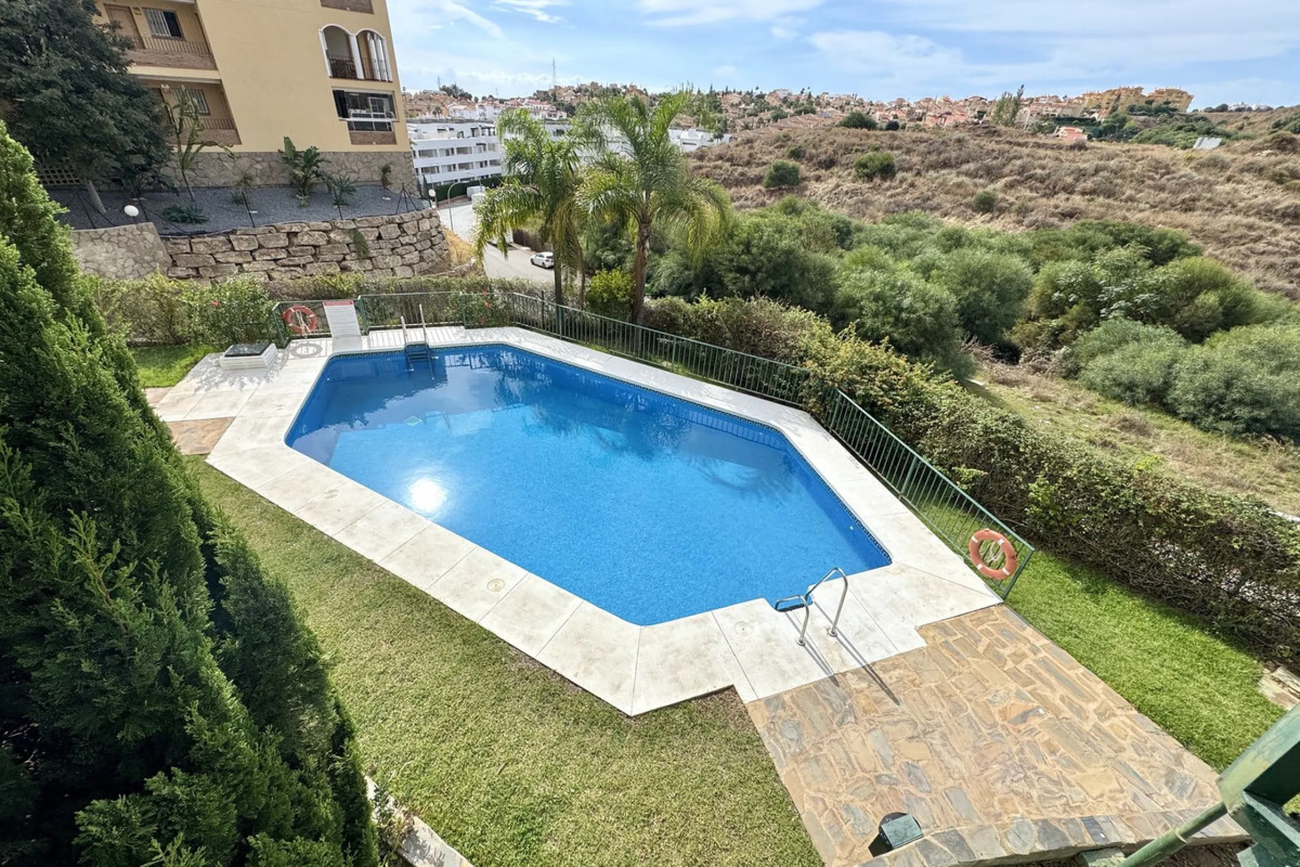 BEST BUY ALERT (Massively Reduced) - 2 bed, 2 bath penthouse in Mijas Costa with enormous 150m2 wrap around terrace / solarium, all with beautiful panoramic sea views.