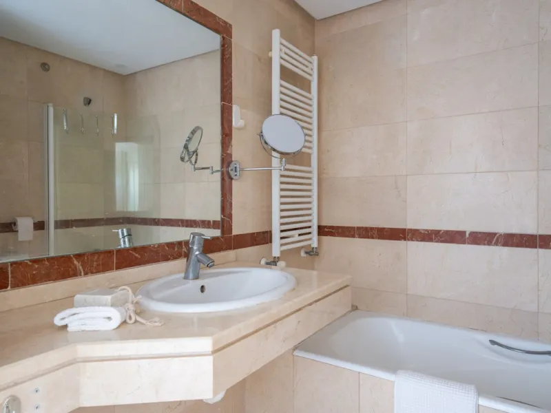 This charming property offers a very convenient floorplan with three bedrooms, two bathrooms, and a guest toilet. Presented in its original yet well-maintained condition, it provides a wonderful opportunity to personalize while preserving its timeless cha