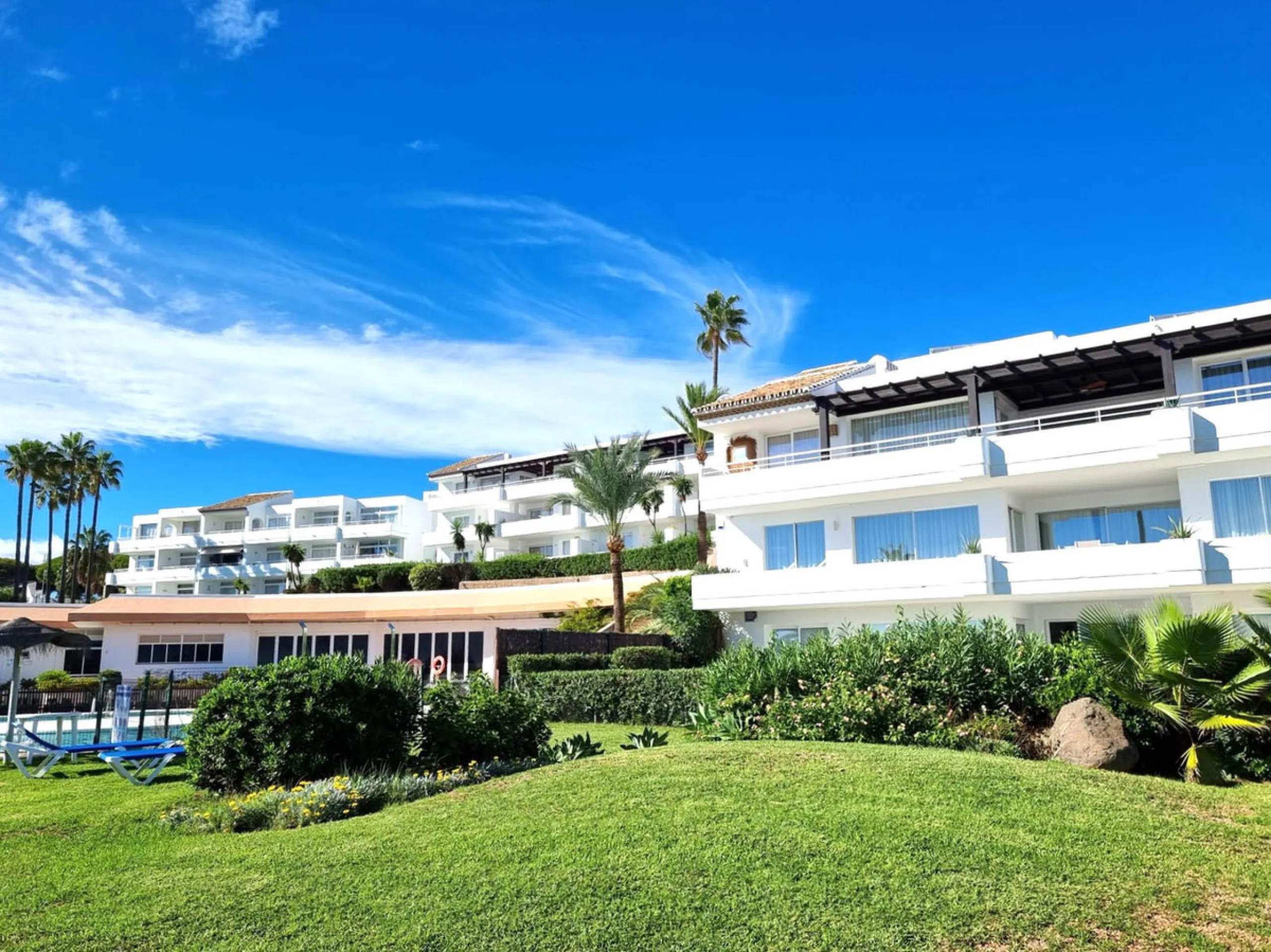 Step into coastal luxury with this exceptional 1-bedroom, 70 m² beachfront apartment, located in the prestigious Miraflores community on the Costa del Sol. Immaculately refurbished to the highest standards, this rare gem offers breathtaking Mediterranean 