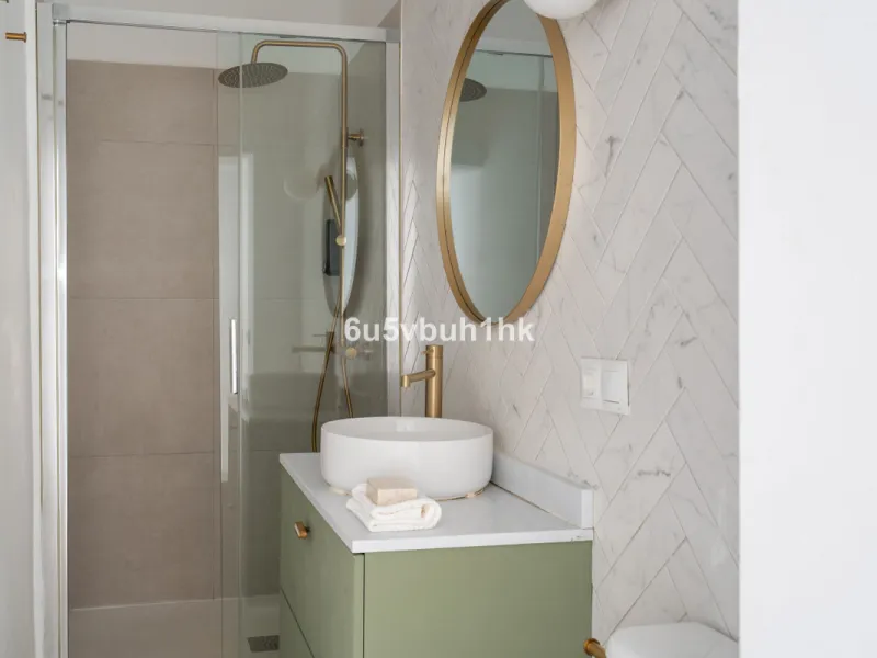 Imagine living in Málaga's historic center, on a wide and quiet street just a stone's throw from Calle Carretería. This apartment has something rare—a feeling of space, privacy, and uplifting light that fills every room. Step out onto any of the three sun