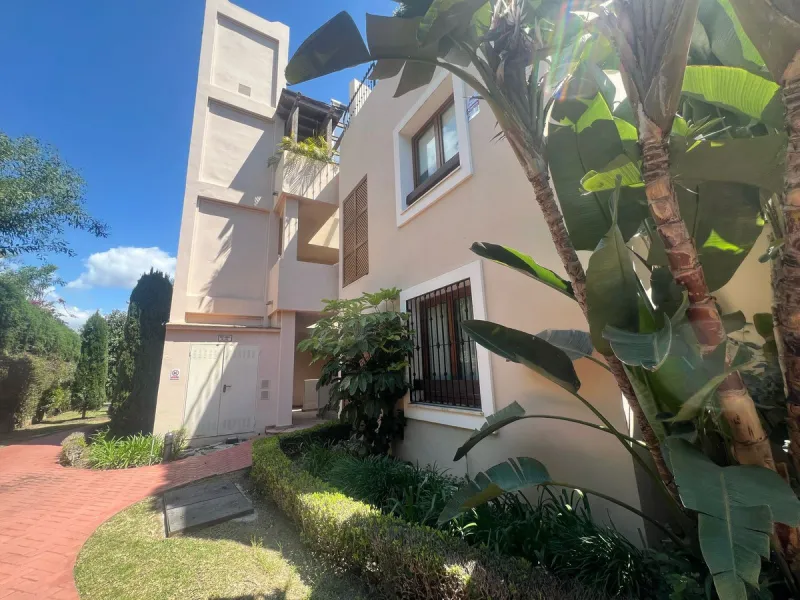 Discover this exceptional first-floor corner apartment, where modern comfort meets breathtaking scenery. Boasting two expansive, glassed in terraces, the residence offers panoramic views that stretch from the sparkling Mediterranean Sea to the majestic su