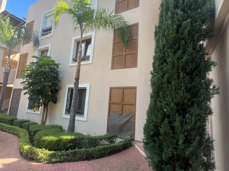 Discover this exceptional first-floor corner apartment, where modern comfort meets breathtaking scenery. Boasting two expansive, glassed in terraces, the residence offers panoramic views that stretch from the sparkling Mediterranean Sea to the majestic su
