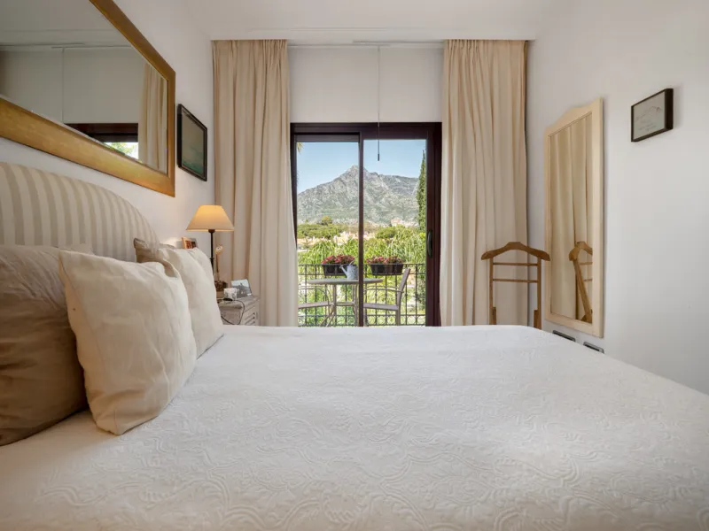 Townhouse Oasis is a five-bedroom luxury home in one of Marbella's most prestigious gated communities on the Golden Mile. Surrounded by tropical gardens, this townhouse offers privacy, comfort, and Mediterranean charm. With multiple terraces, a private ga