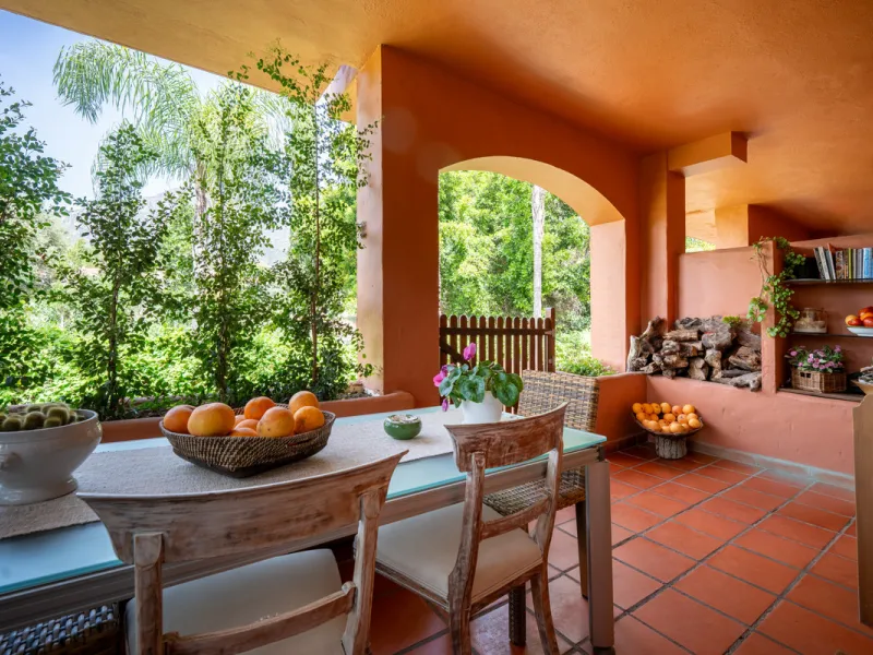 Townhouse Oasis is a five-bedroom luxury home in one of Marbella's most prestigious gated communities on the Golden Mile. Surrounded by tropical gardens, this townhouse offers privacy, comfort, and Mediterranean charm. With multiple terraces, a private ga