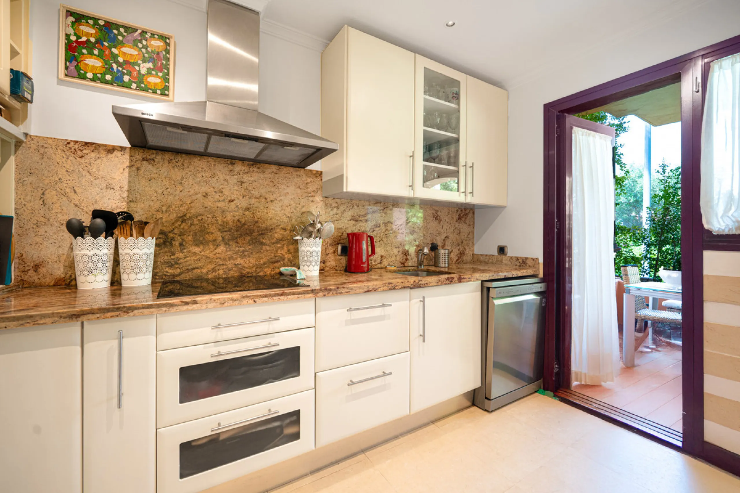 Townhouse Oasis is a five-bedroom luxury home in one of Marbella's most prestigious gated communities on the Golden Mile. Surrounded by tropical gardens, this townhouse offers privacy, comfort, and Mediterranean charm. With multiple terraces, a private ga