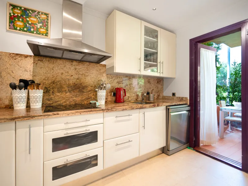 Townhouse Oasis is a five-bedroom luxury home in one of Marbella's most prestigious gated communities on the Golden Mile. Surrounded by tropical gardens, this townhouse offers privacy, comfort, and Mediterranean charm. With multiple terraces, a private ga