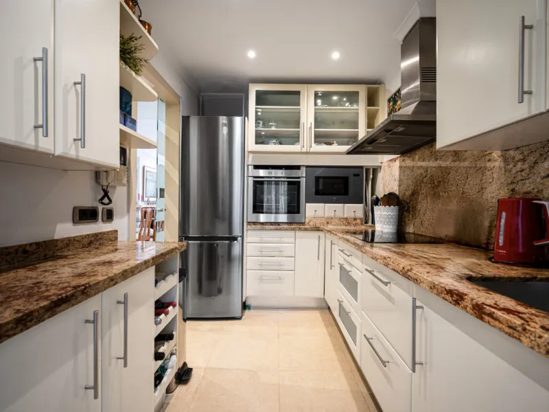 Townhouse Oasis is a five-bedroom luxury home in one of Marbella's most prestigious gated communities on the Golden Mile. Surrounded by tropical gardens, this townhouse offers privacy, comfort, and Mediterranean charm. With multiple terraces, a private ga