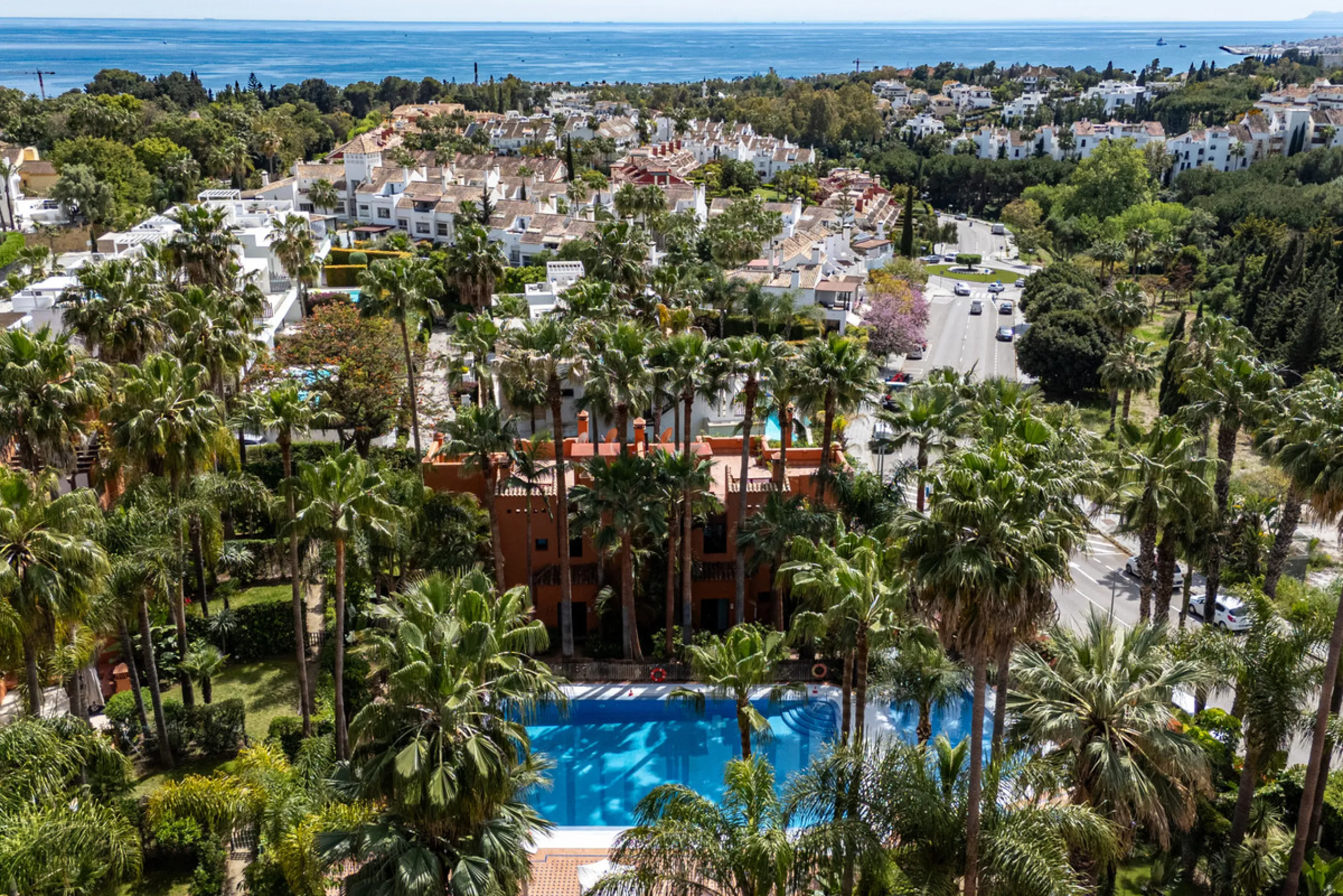 Townhouse Oasis is a five-bedroom luxury home in one of Marbella's most prestigious gated communities on the Golden Mile. Surrounded by tropical gardens, this townhouse offers privacy, comfort, and Mediterranean charm. With multiple terraces, a private ga