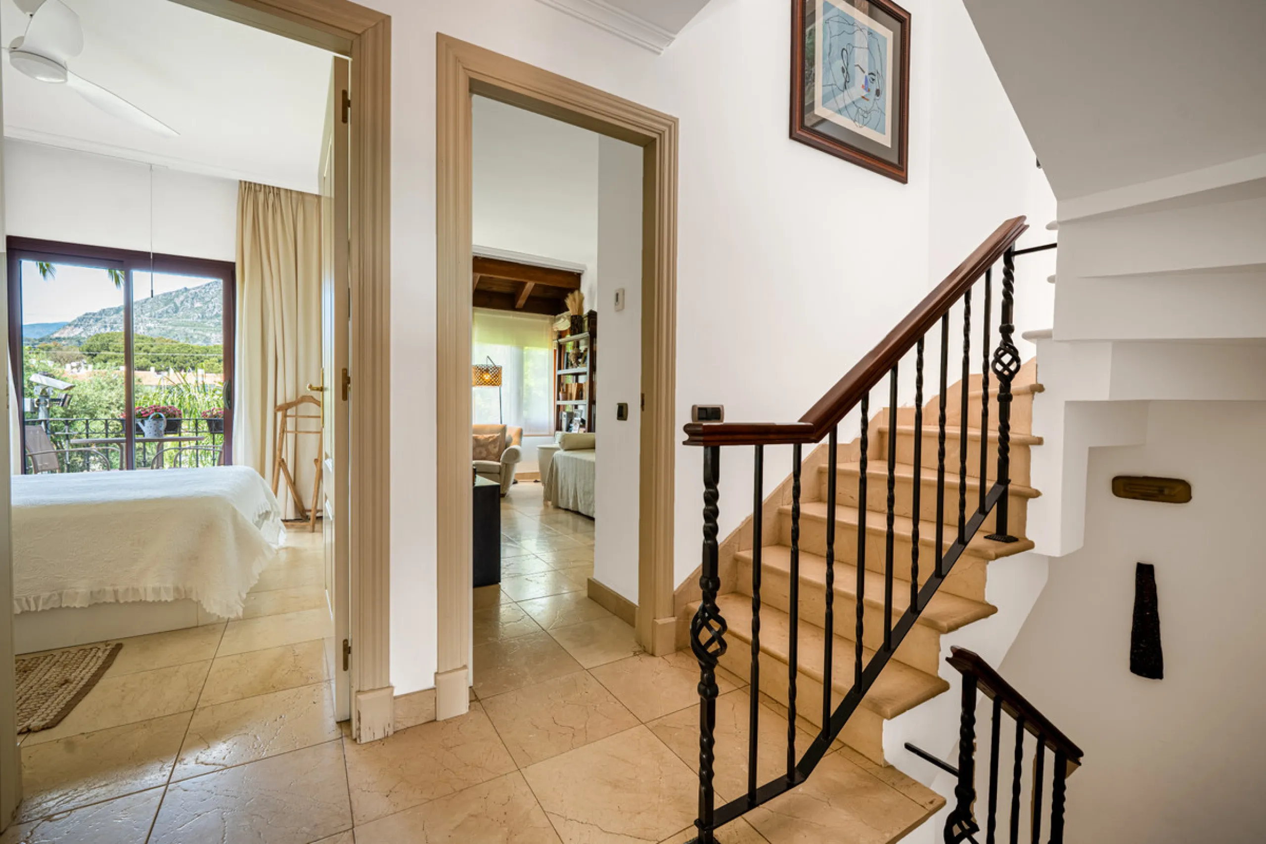 Townhouse Oasis is a five-bedroom luxury home in one of Marbella's most prestigious gated communities on the Golden Mile. Surrounded by tropical gardens, this townhouse offers privacy, comfort, and Mediterranean charm. With multiple terraces, a private ga