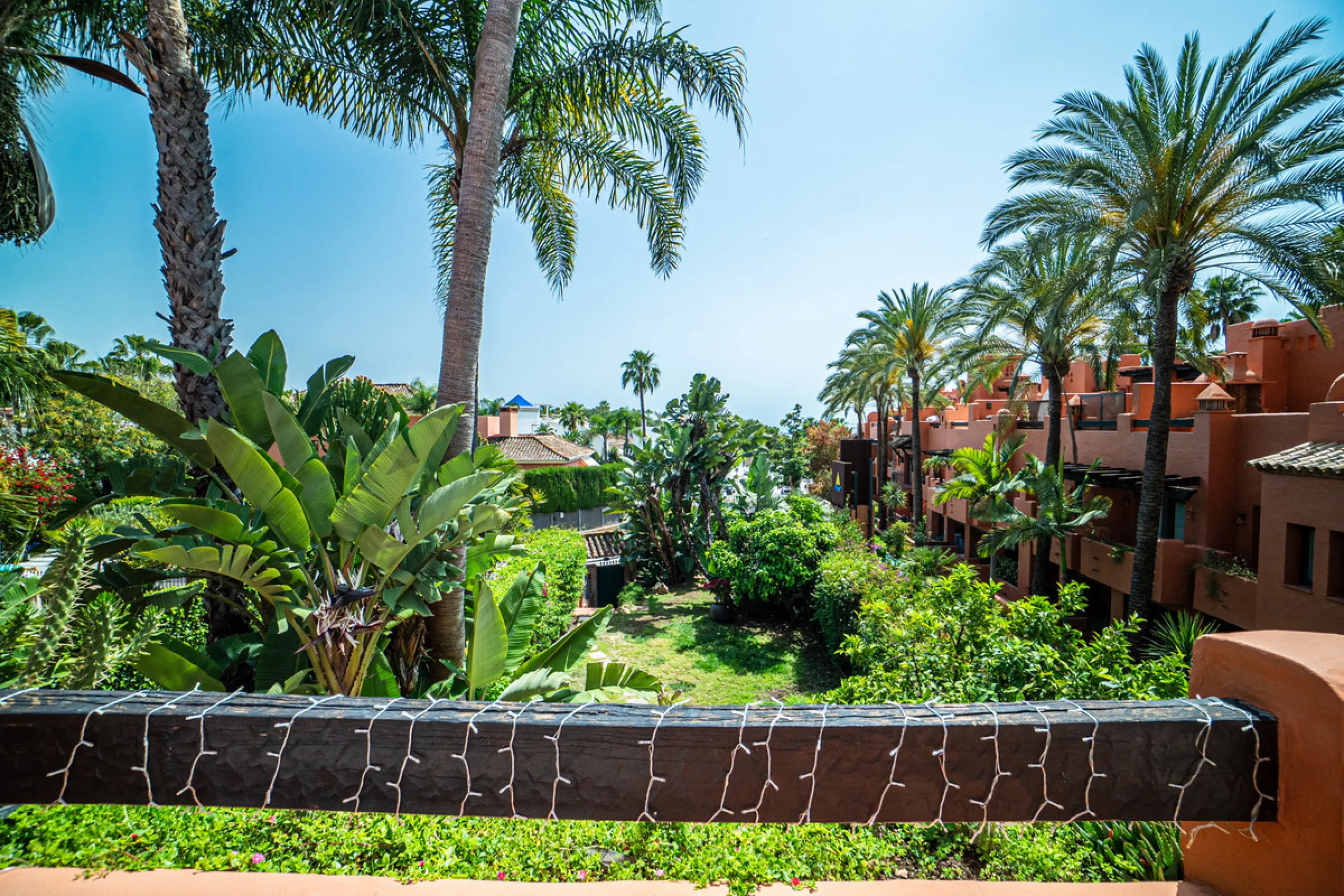 Townhouse Oasis is a five-bedroom luxury home in one of Marbella's most prestigious gated communities on the Golden Mile. Surrounded by tropical gardens, this townhouse offers privacy, comfort, and Mediterranean charm. With multiple terraces, a private ga