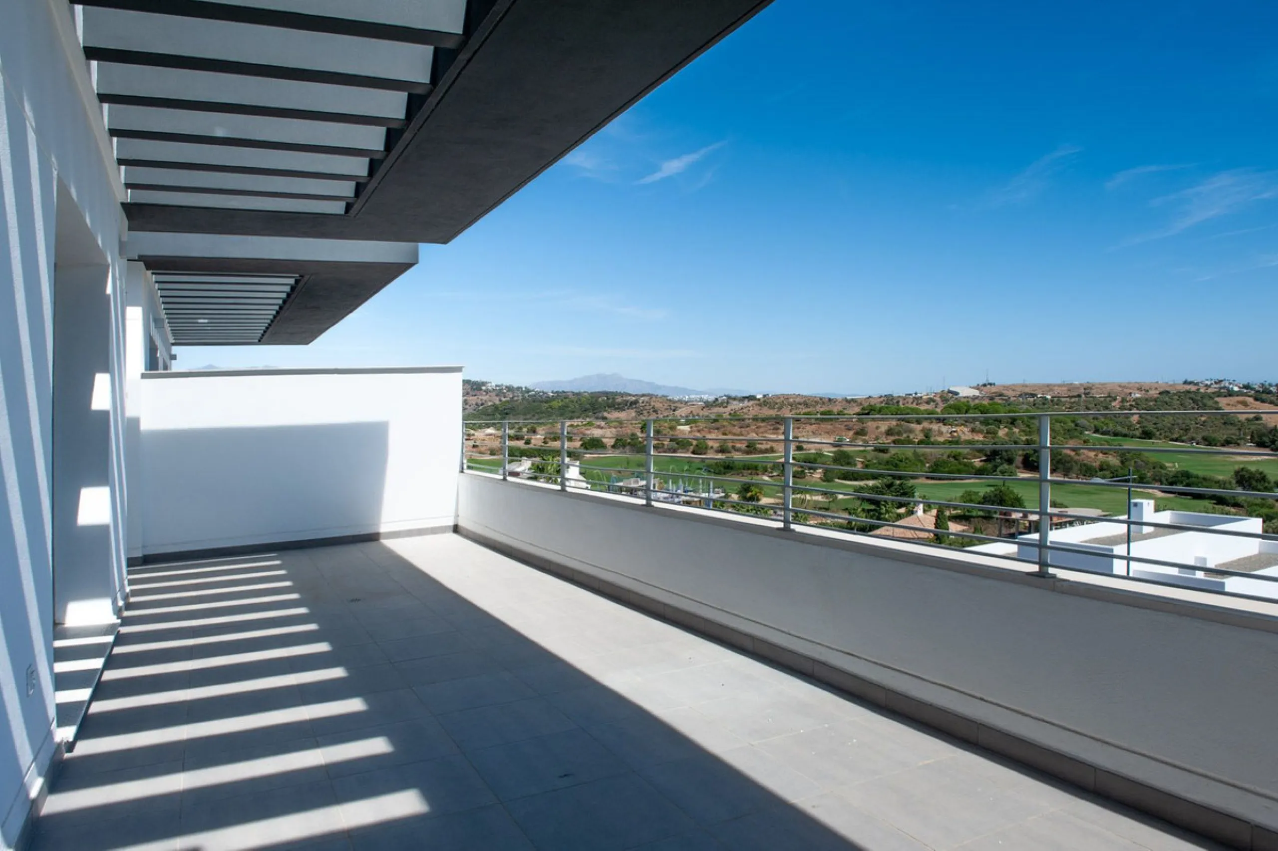 Move-in ready, brand new, modern, top-floor apartment for sale in a golf urbanization near Estepona town