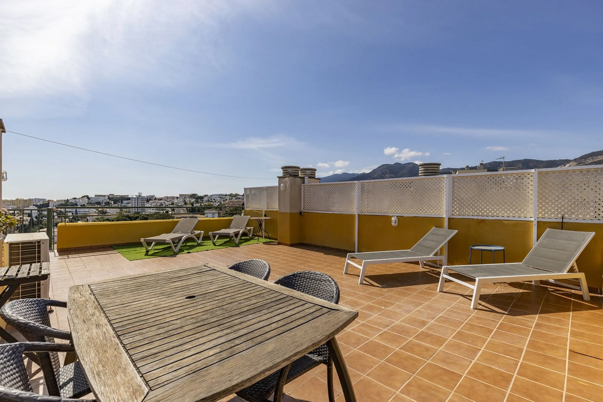 A beautiful South West facing penthouse with a roof terrace, amazing views, walking distance to public transport and local amenities, underground parking, a storage room and on a community which allows short term rentals (subject to the new buyer going th